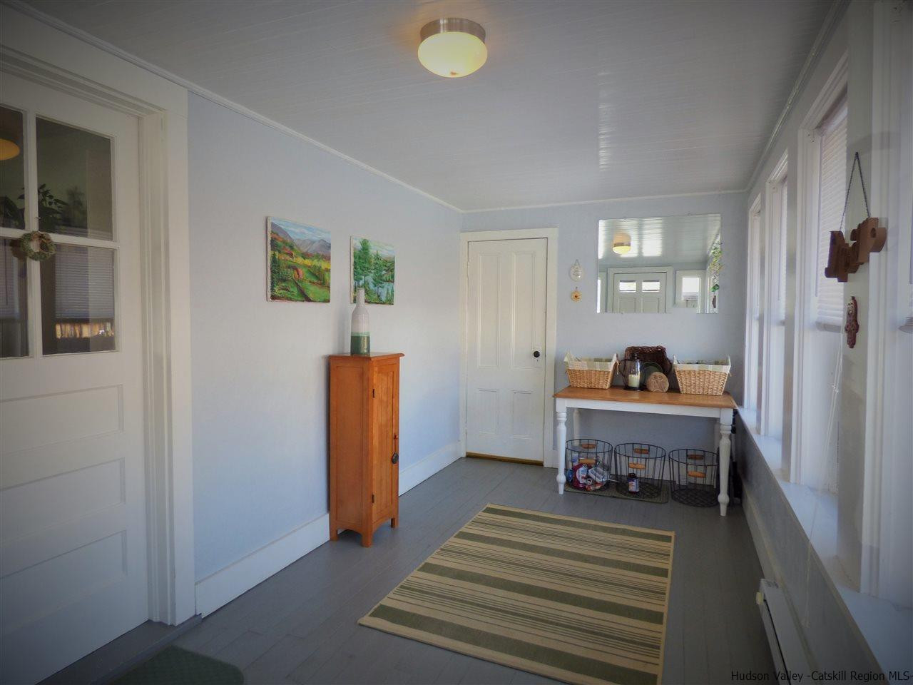 21 Crittenden Street Wallkill, NY 12589 - Photo 4 of 28 a bed room with a bed and a window