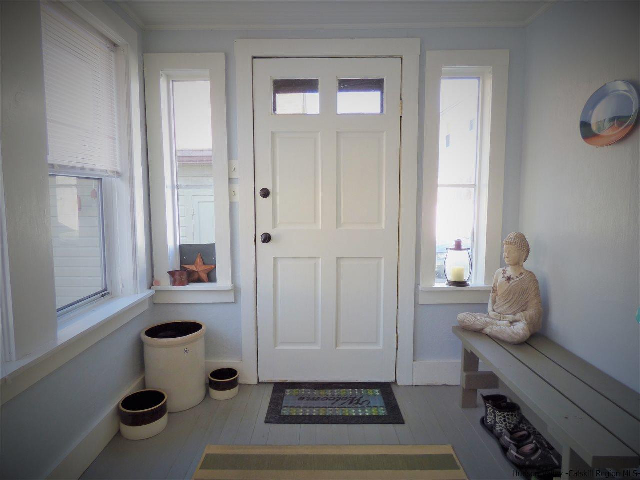 21 Crittenden Street Wallkill, NY 12589 - Photo 5 of 28 a room with chair and white walls