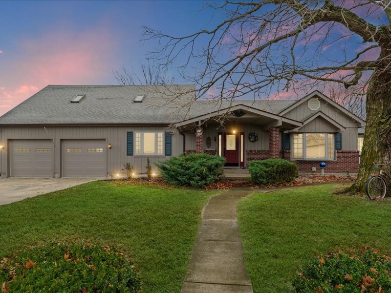 15742 Moody Road Oakland, IL 61943 - Photo 2 of 48 a front view of a house with a yard