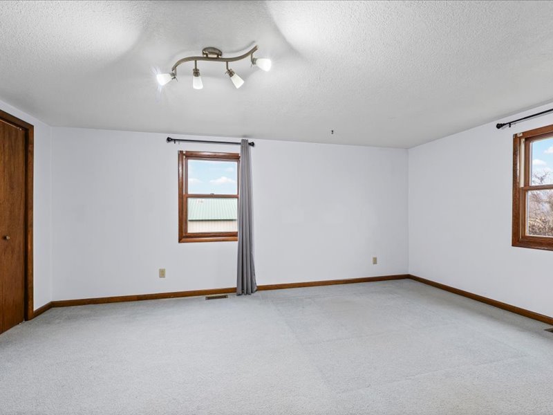 15742 Moody Road Oakland, IL 61943 - Photo 22 of 48 an empty room with windows
