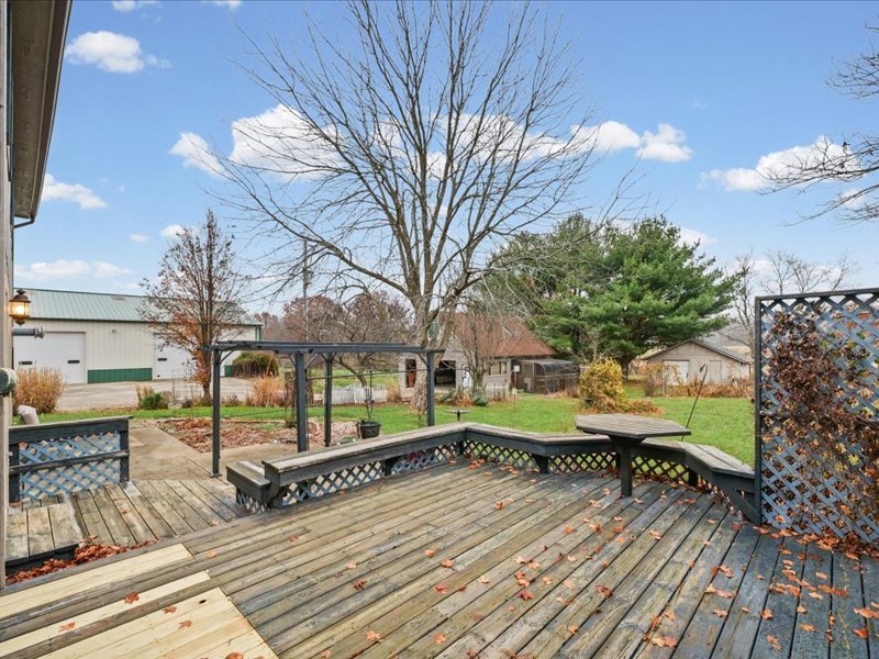 15742 Moody Road Oakland, IL 61943 - Photo 28 of 48 a view of a wooden chairs on the deck