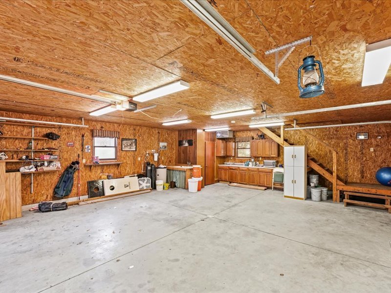 15742 Moody Road Oakland, IL 61943 - Photo 31 of 48 a view of a garage with parked cars