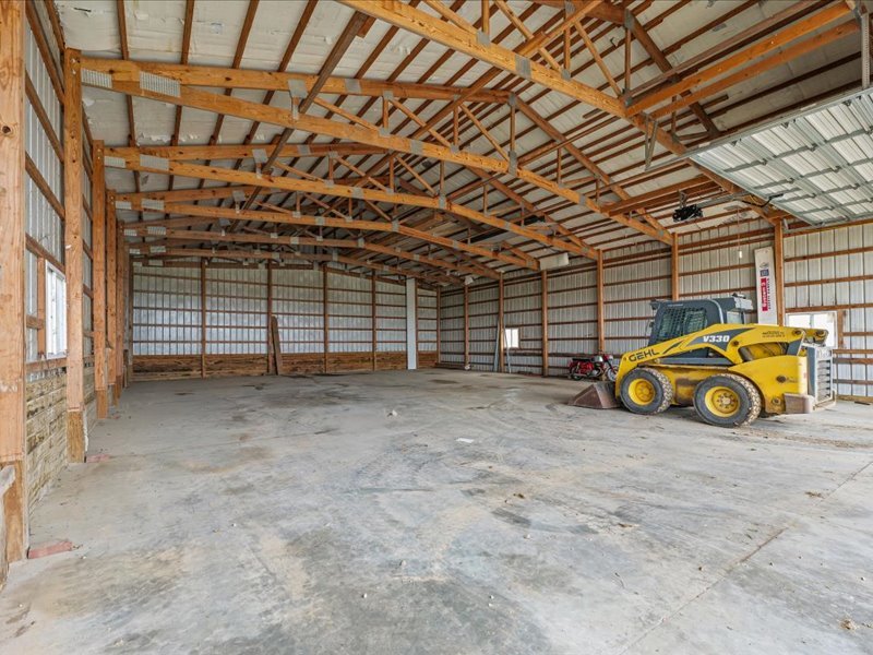15742 Moody Road Oakland, IL 61943 - Photo 37 of 48 a view of a garage with parked cars