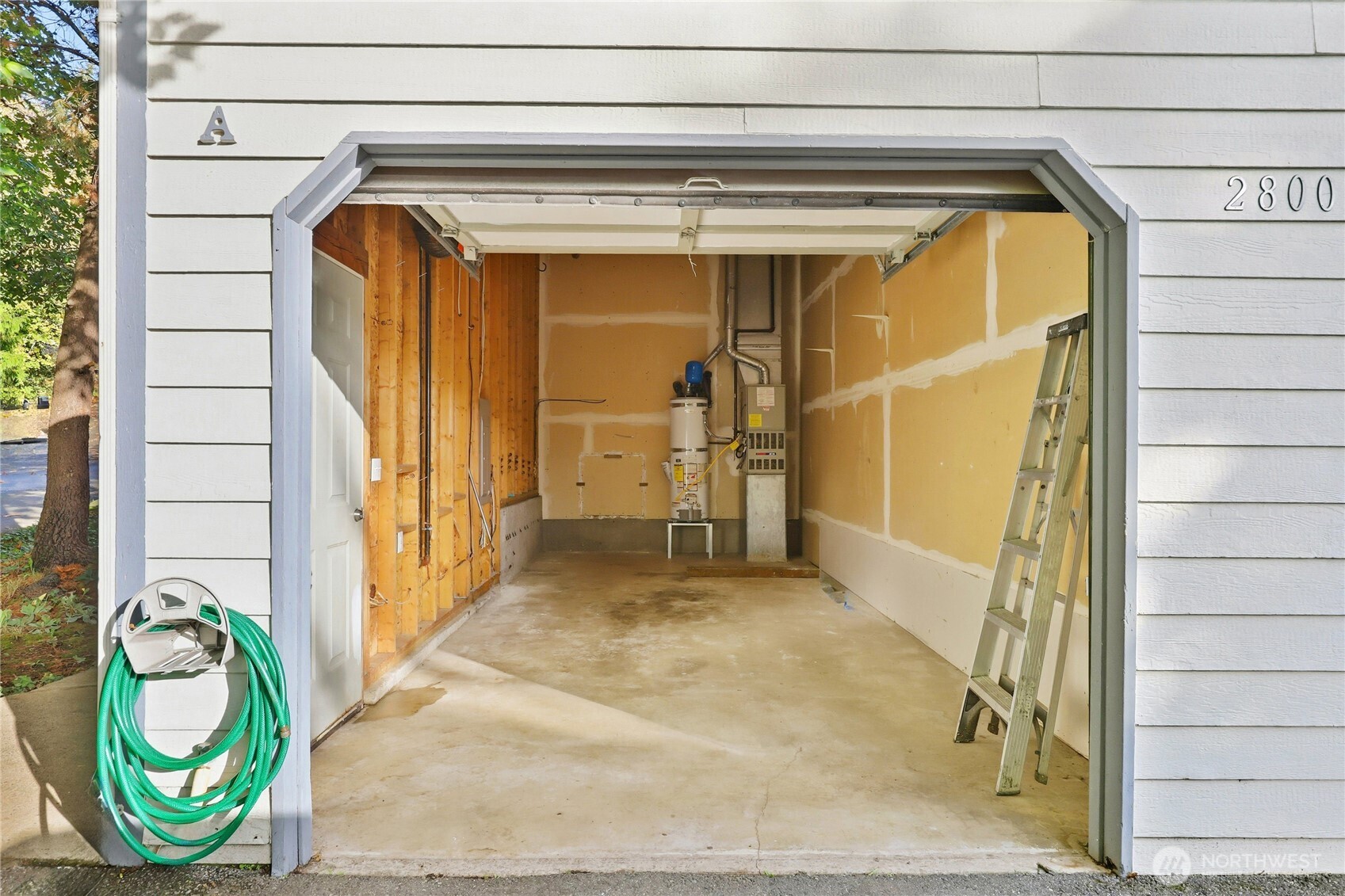 2800 Pine Road Northeast Bremerton, WA 98310 - Photo 19 of 38 a view of water heater door with wooden floor