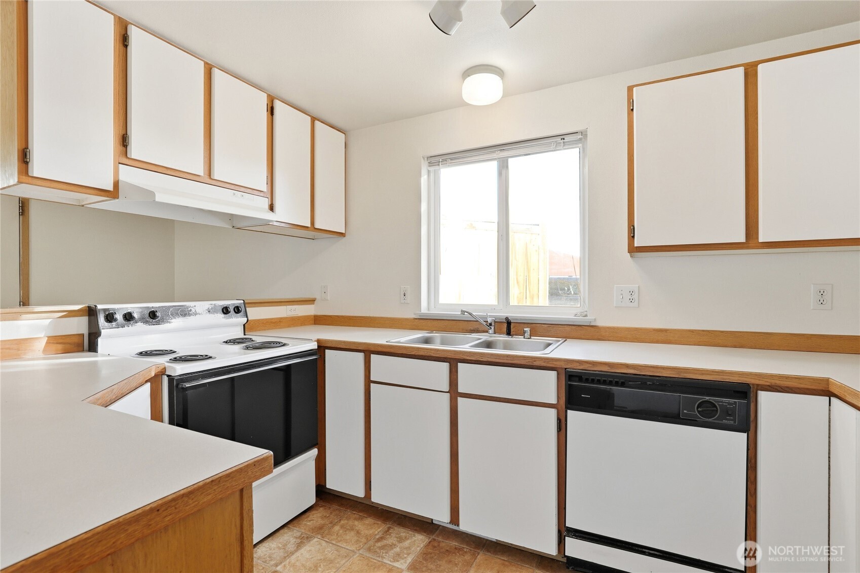 2800 Pine Road Northeast Bremerton, WA 98310 - Photo 25 of 38 a kitchen with stainless steel appliances granite countertop a sink stove and cabinets