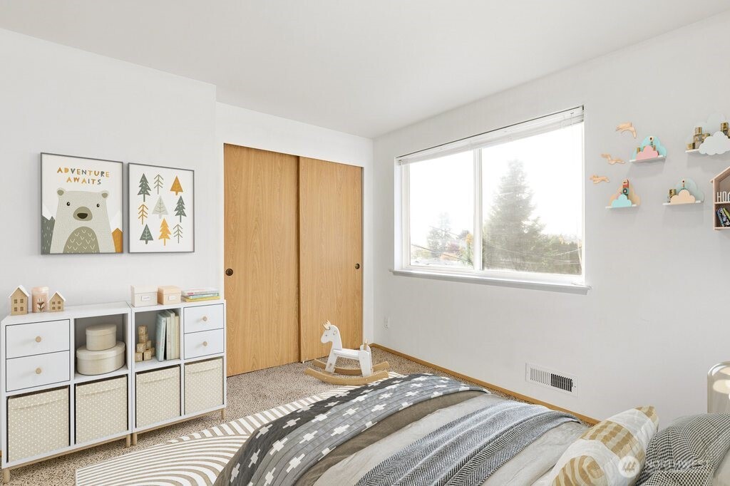 2800 Pine Road Northeast Bremerton, WA 98310 - Photo 32 of 38 a bedroom with a bed and a window