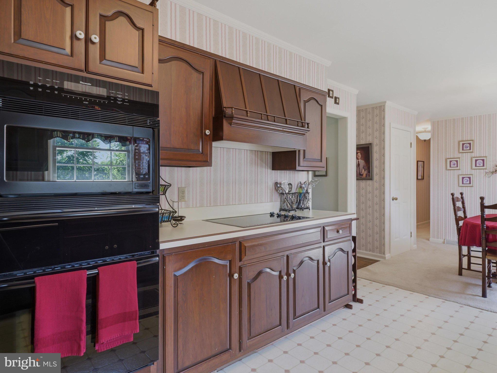 2606 Ridge Road South Martinsburg, WV 25403 - Photo 11 of 57 Charming kitchen with classic wood cabinetry.