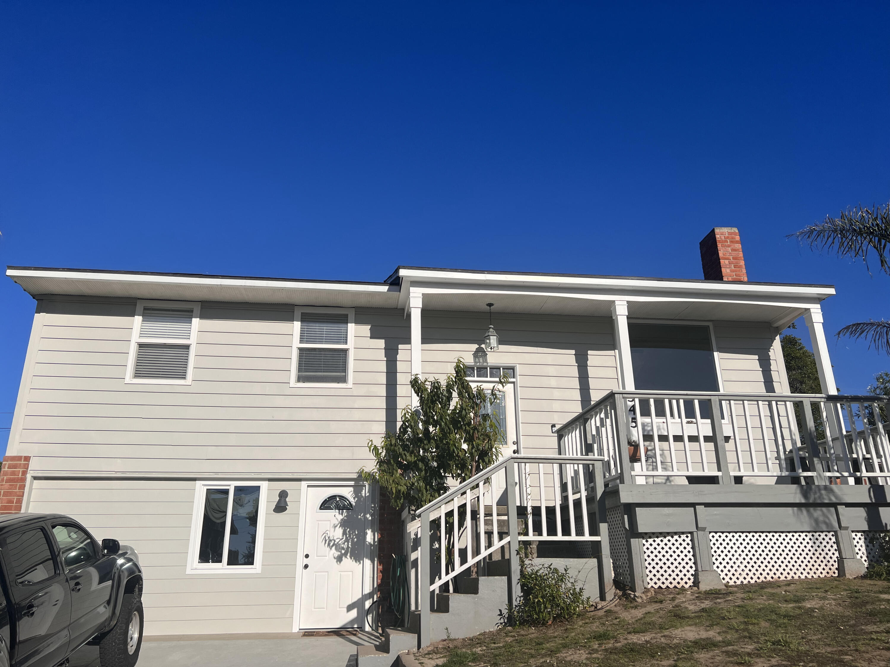 a view of house with deck