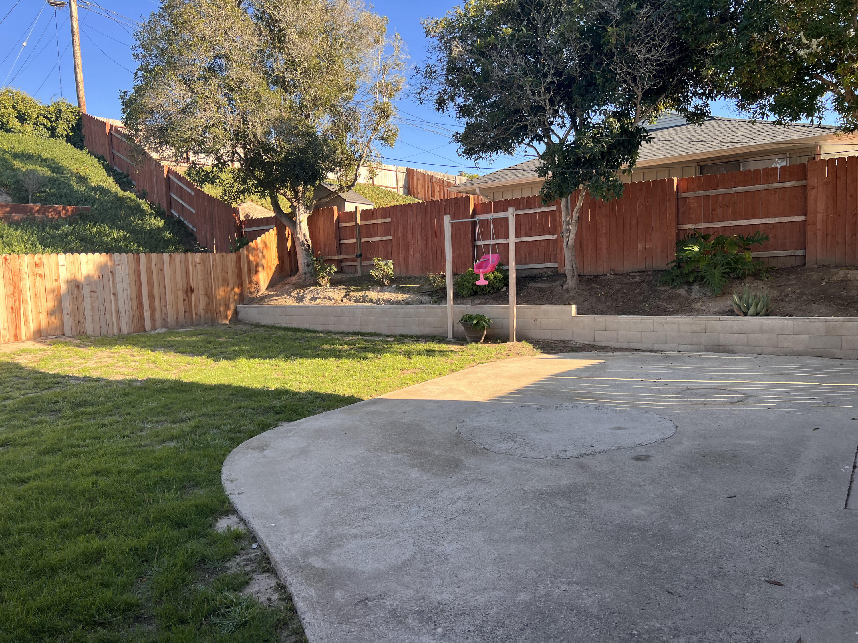 545 Sunbeam Road, Unit A Lompoc, CA 93436 - Photo 14 of 15 a view of a house with a yard garage and tree
