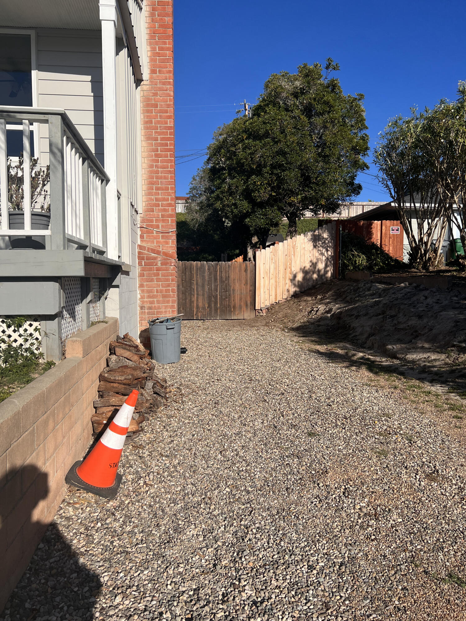 545 Sunbeam Road, Unit A Lompoc, CA 93436 - Photo 15 of 15 a backyard of a house with table and chairs