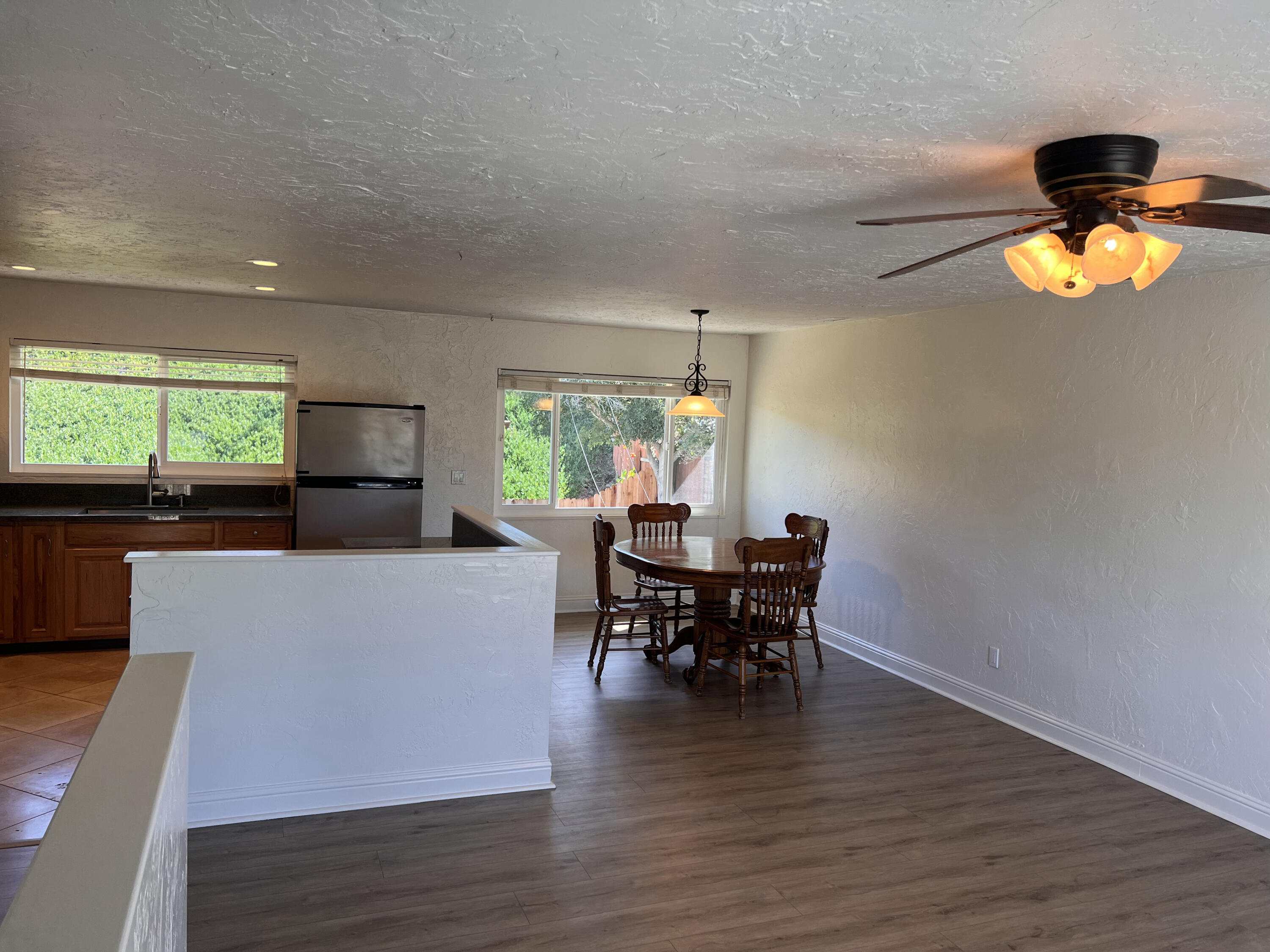 545 Sunbeam Road, Unit A Lompoc, CA 93436 - Photo 3 of 15 a view of a dining room with furniture window and wooden floor