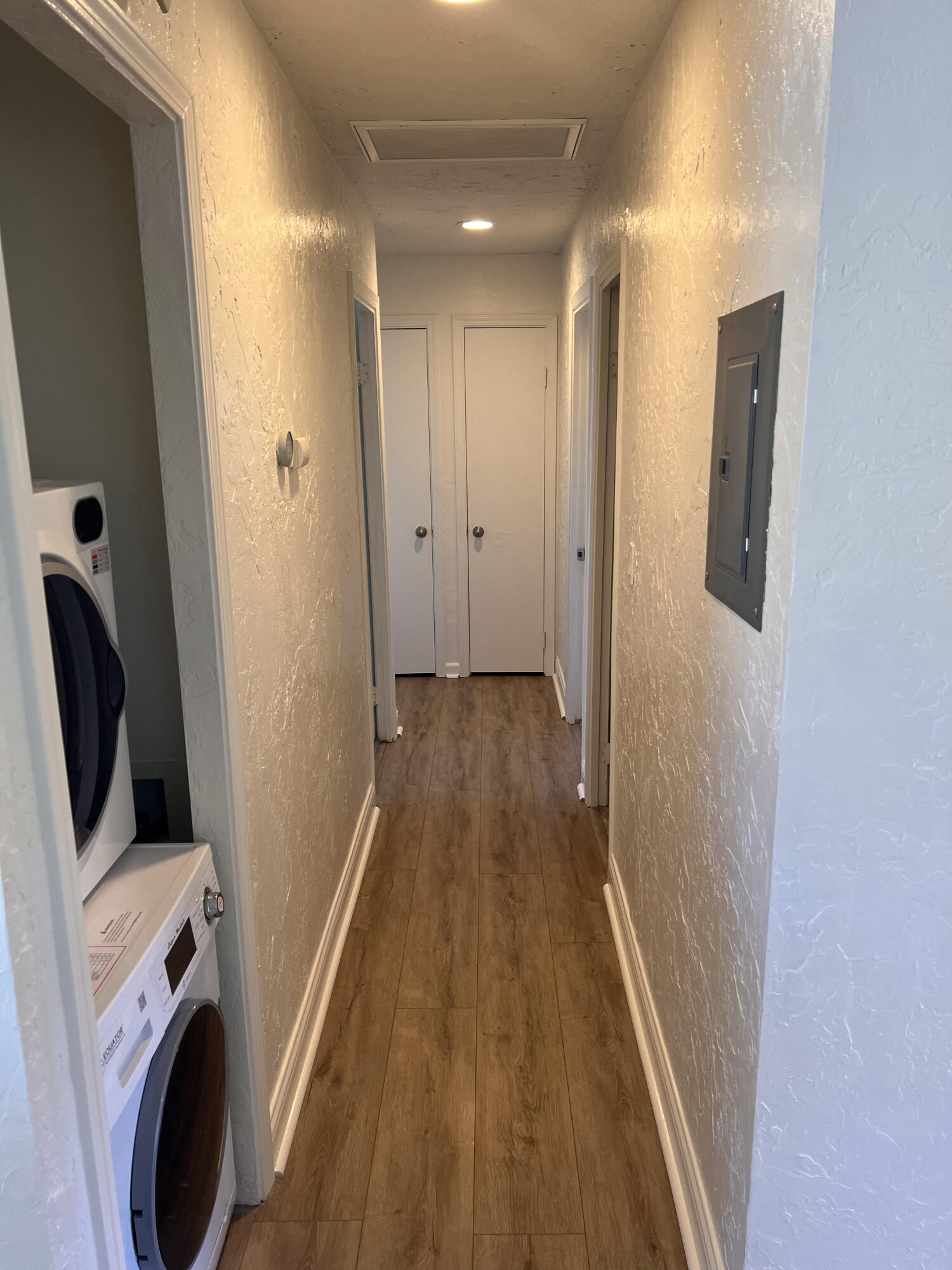 545 Sunbeam Road, Unit A Lompoc, CA 93436 - Photo 5 of 15 a view of a hallway with washer and dryer