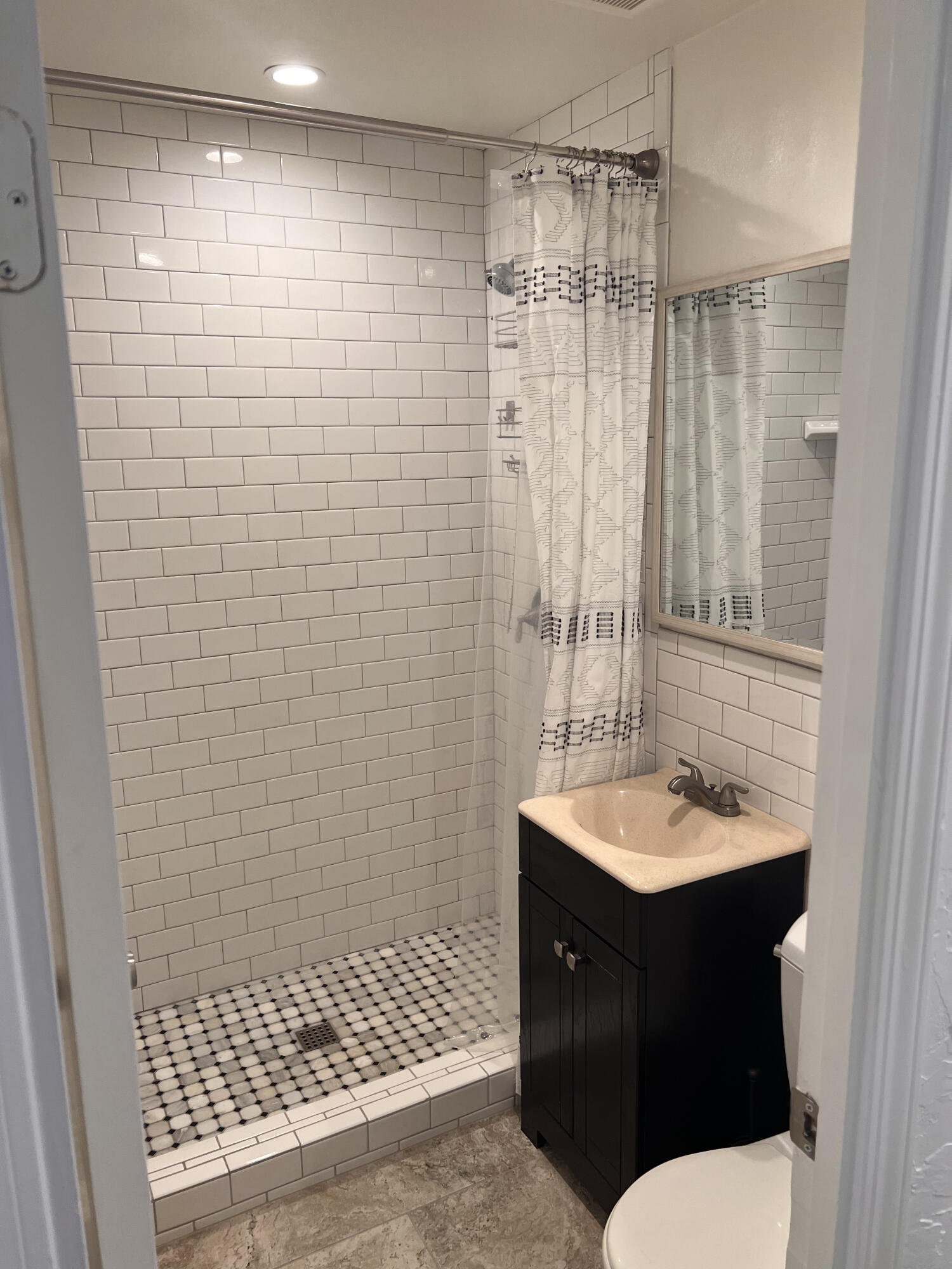 545 Sunbeam Road, Unit A Lompoc, CA 93436 - Photo 7 of 15 a bathroom with a sink toilet and shower