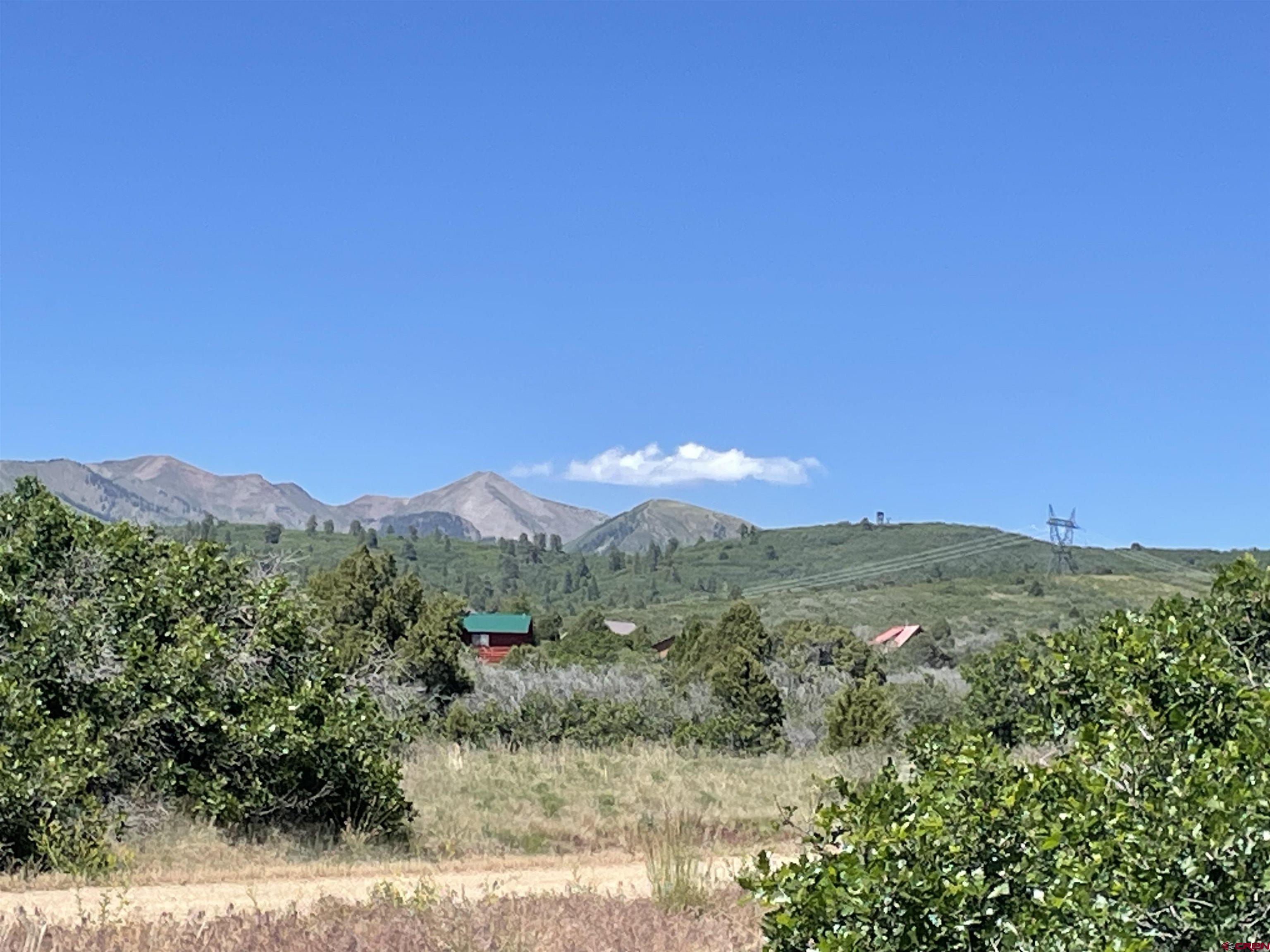 902 Roberts Ridge Drive Hesperus, CO 81326 - Photo 1 of 14 a view of a mountain range with lush green forest