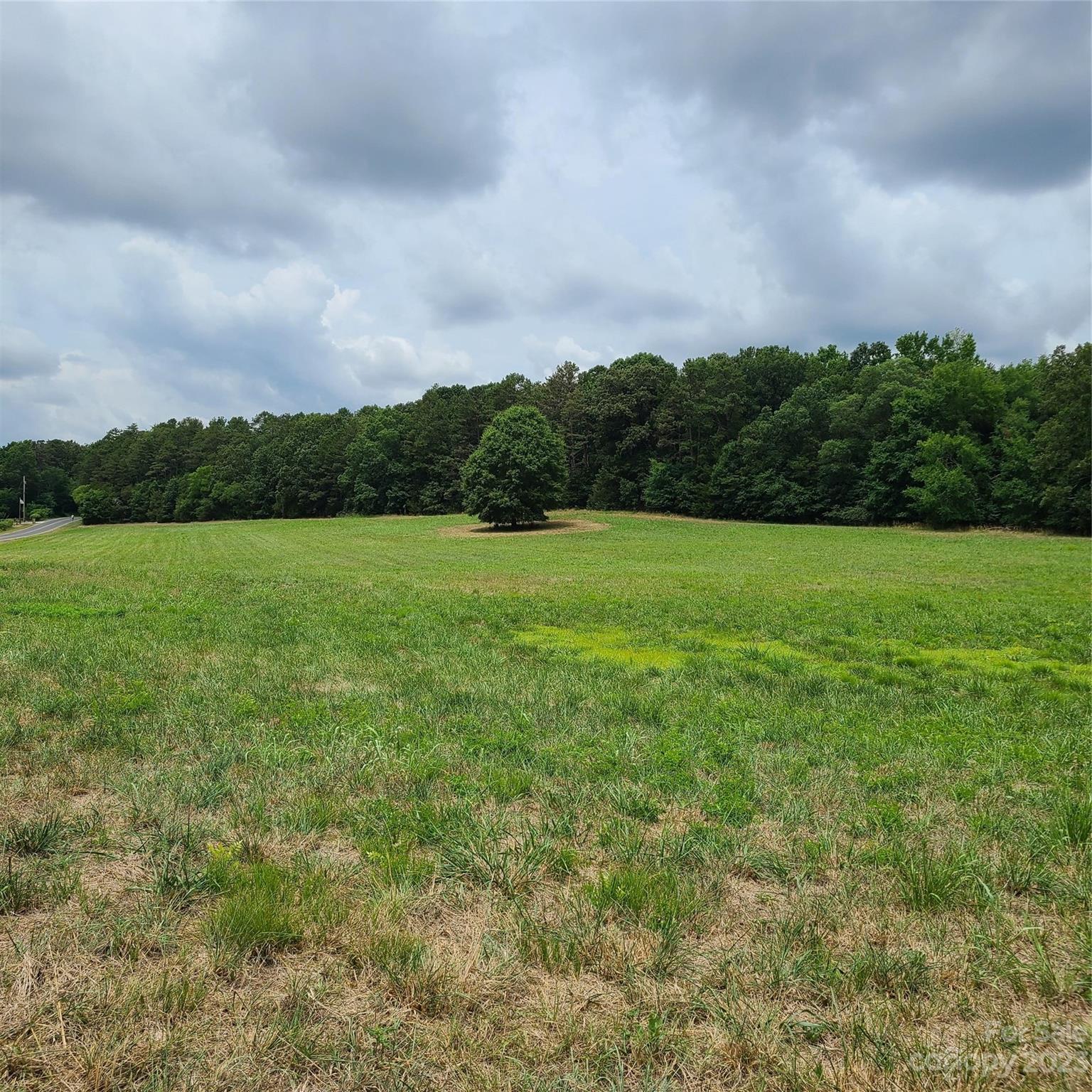 Approx 8.176-on Approx 8.176-on Tite Road Stanfield, NC 28163 - Photo 7 of 18 a view of an outdoor space and a yard