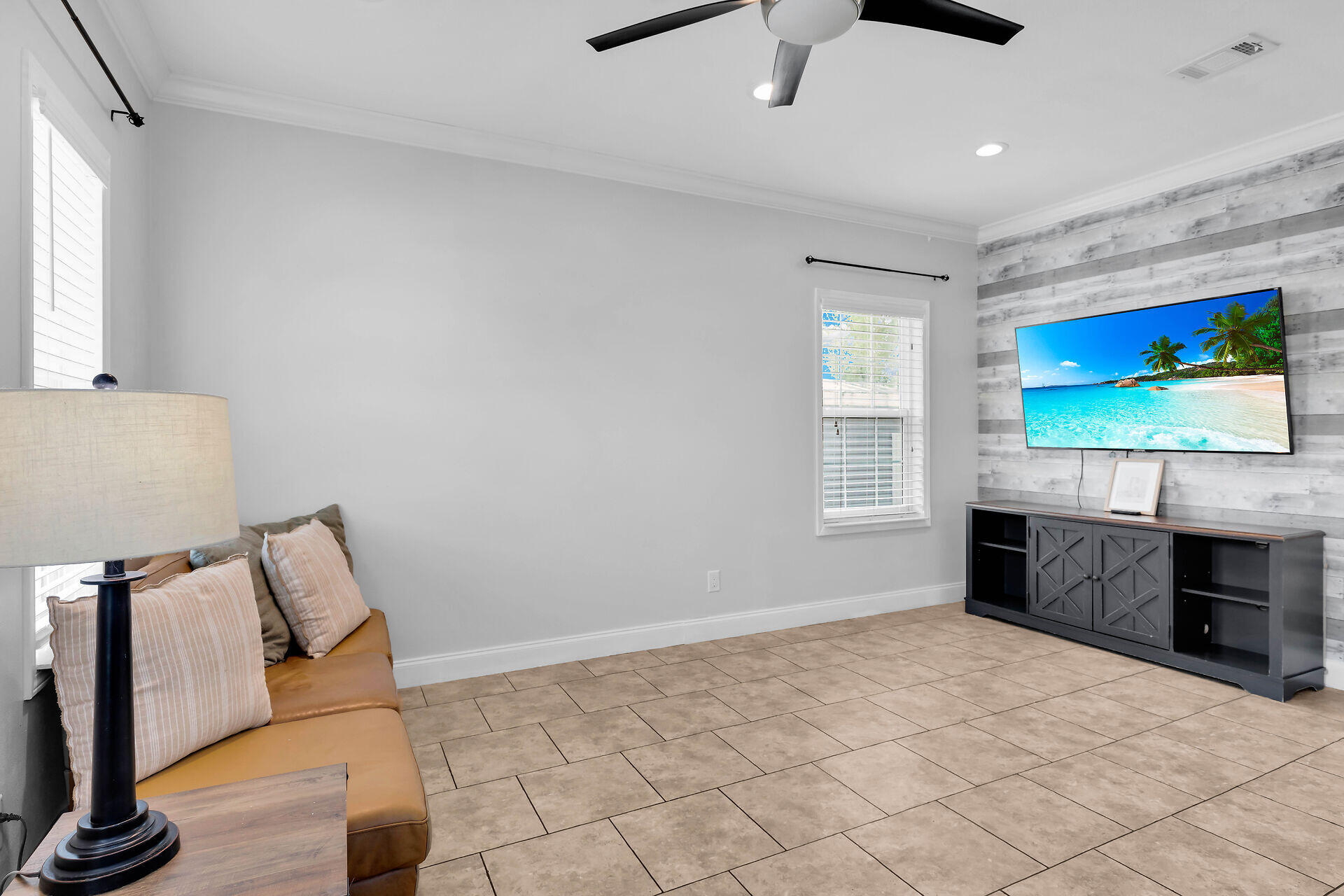 59 Ed Swift Road Key West, FL 33040 - Photo 5 of 35 a living room with furniture and a flat screen tv