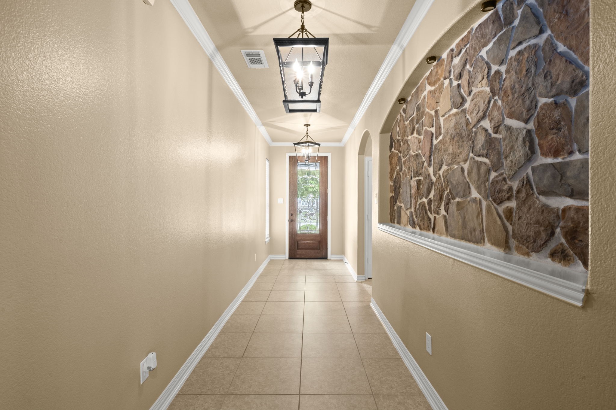 110 David Forest Lane Conroe, TX 77384 - Photo 12 of 35 a view of a hallway with a window