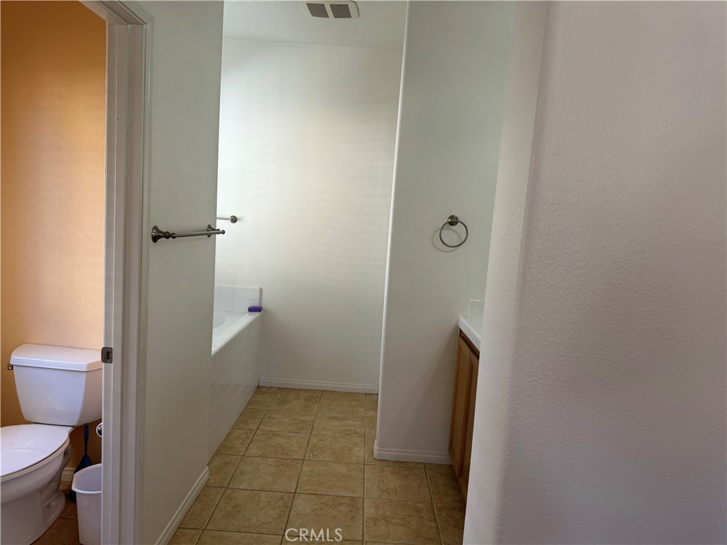 2986 Arbolitos Lane, Unit B Simi Valley, CA 93063 - Photo 17 of 36 a bathroom with a sink and toilet