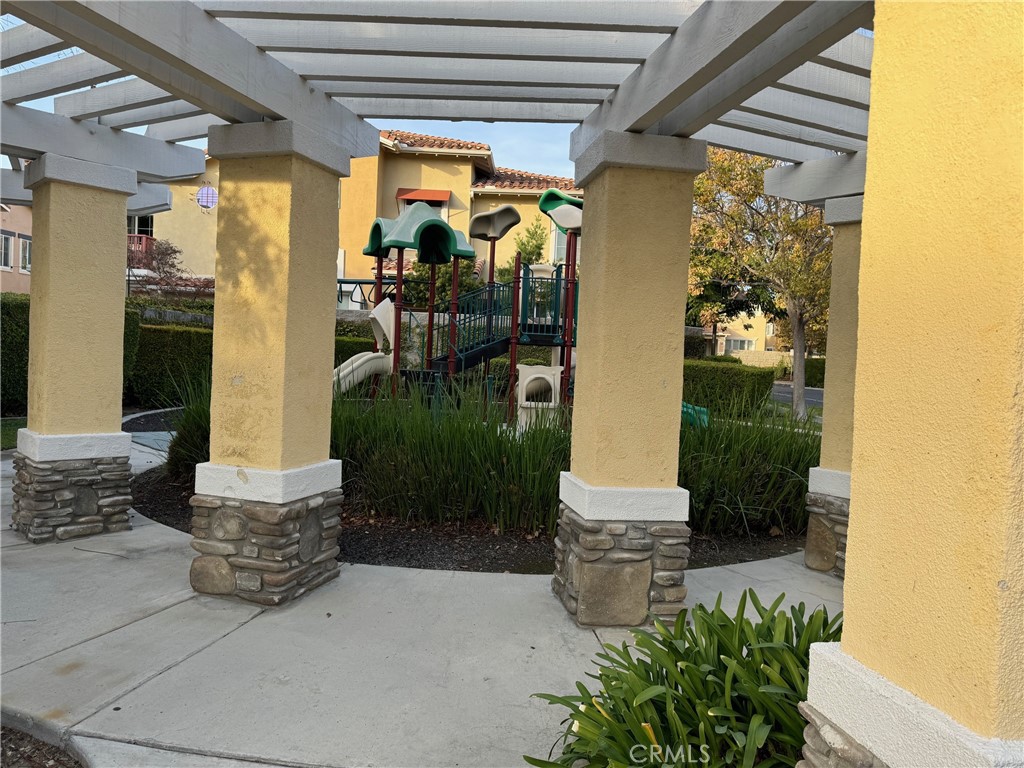 2986 Arbolitos Lane, Unit B Simi Valley, CA 93063 - Photo 29 of 36 a front view of a house with a yard