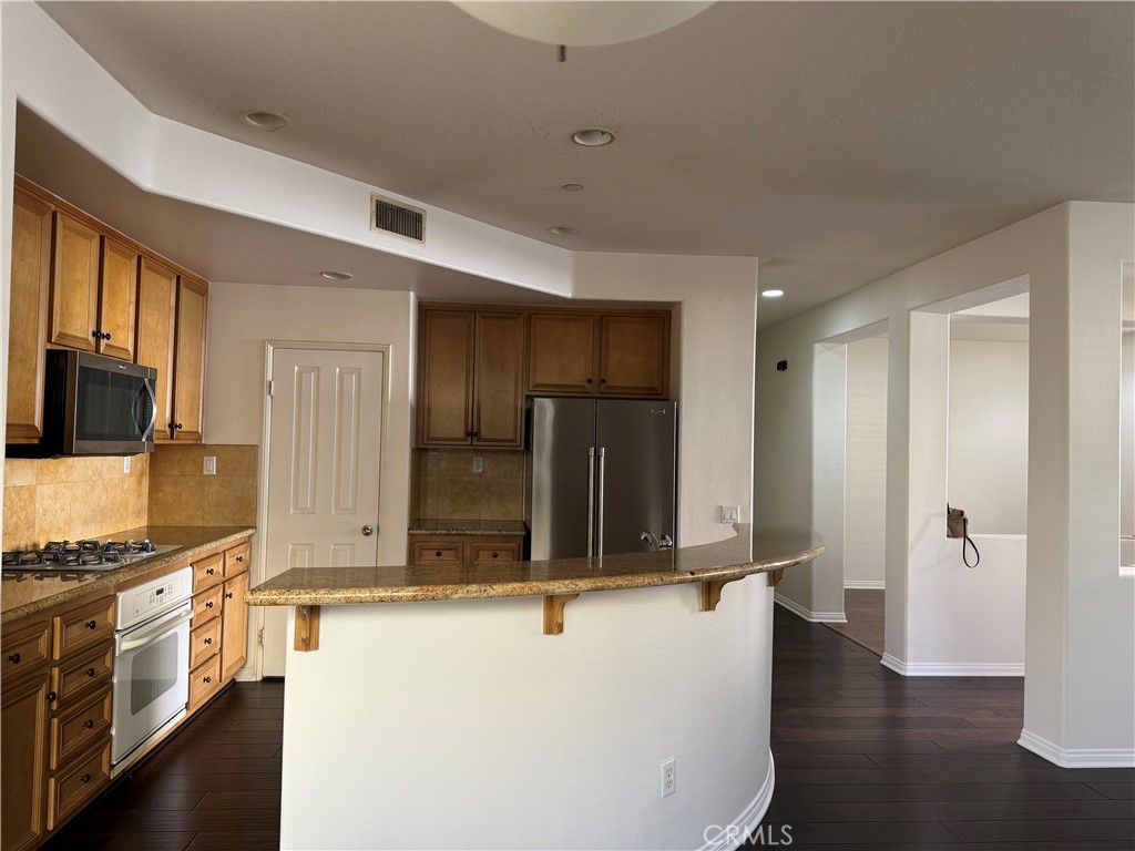 2986 Arbolitos Lane, Unit B Simi Valley, CA 93063 - Photo 3 of 36 a view of a kitchen with a sink
