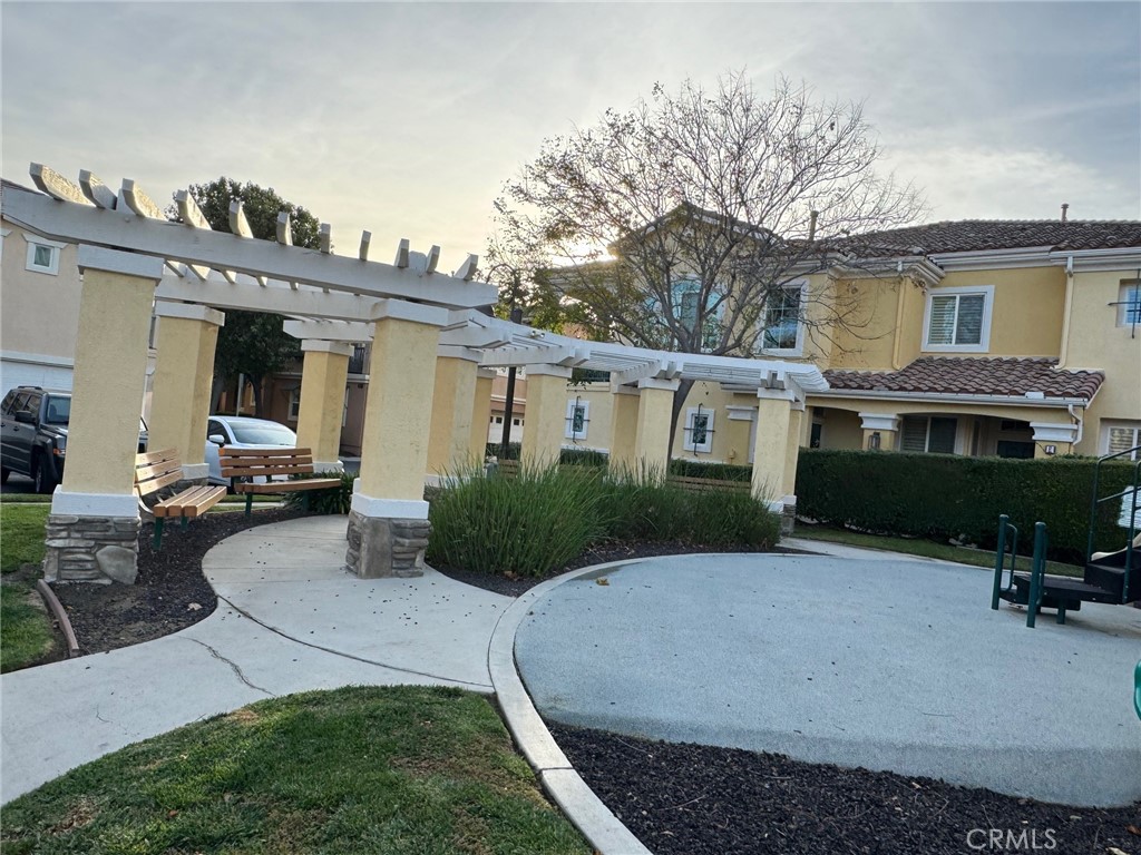 2986 Arbolitos Lane, Unit B Simi Valley, CA 93063 - Photo 31 of 36 a view of a house with a patio