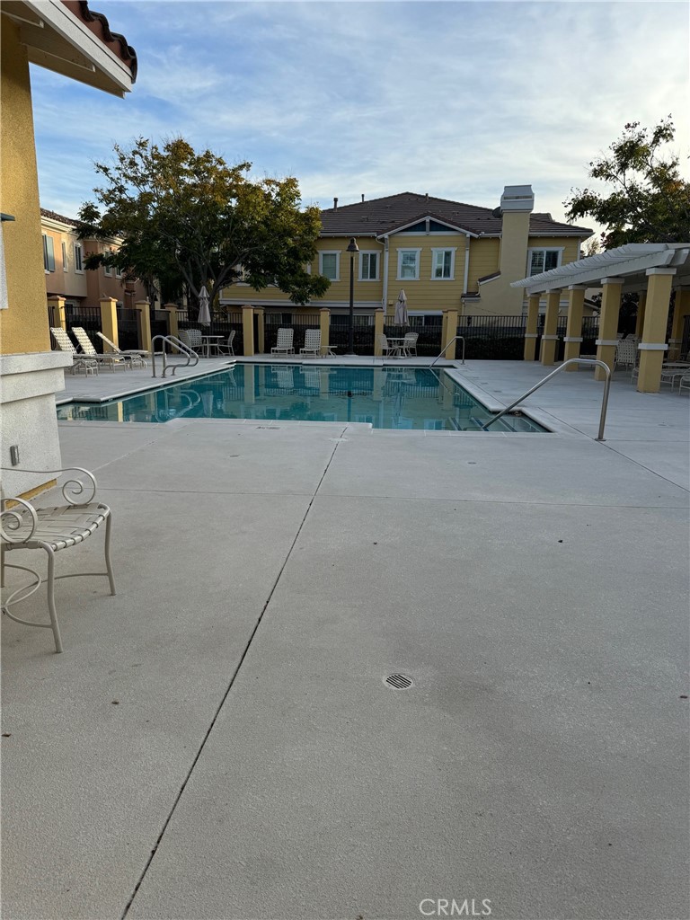 2986 Arbolitos Lane, Unit B Simi Valley, CA 93063 - Photo 35 of 36 a view of a house with a yard