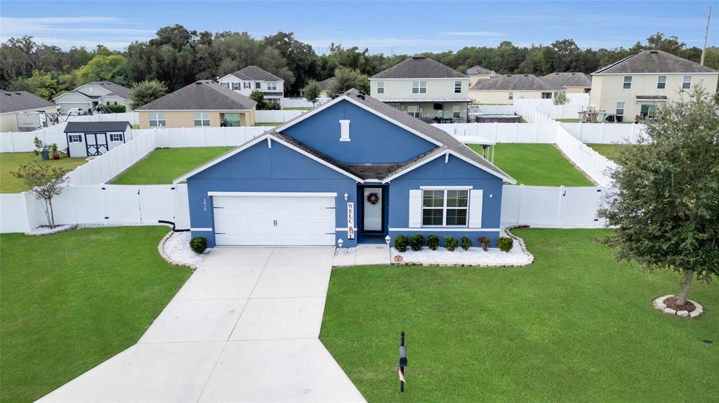 3016 Northeast 43rd Road Ocala, FL 34470 - Photo 1 of 35 a aerial view of a house with a big yard