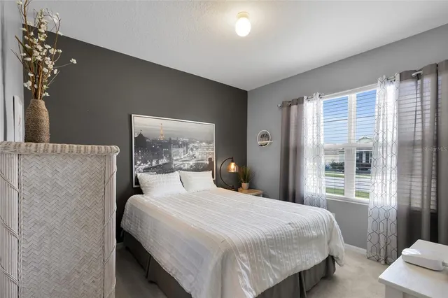 a view of a garage with rack and bicycle