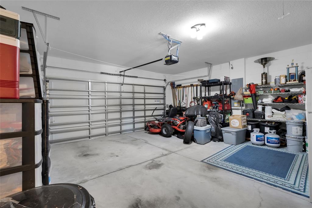 3016 Northeast 43rd Road Ocala, FL 34470 - Photo 18 of 35 a view of a garage with rack and bicycle