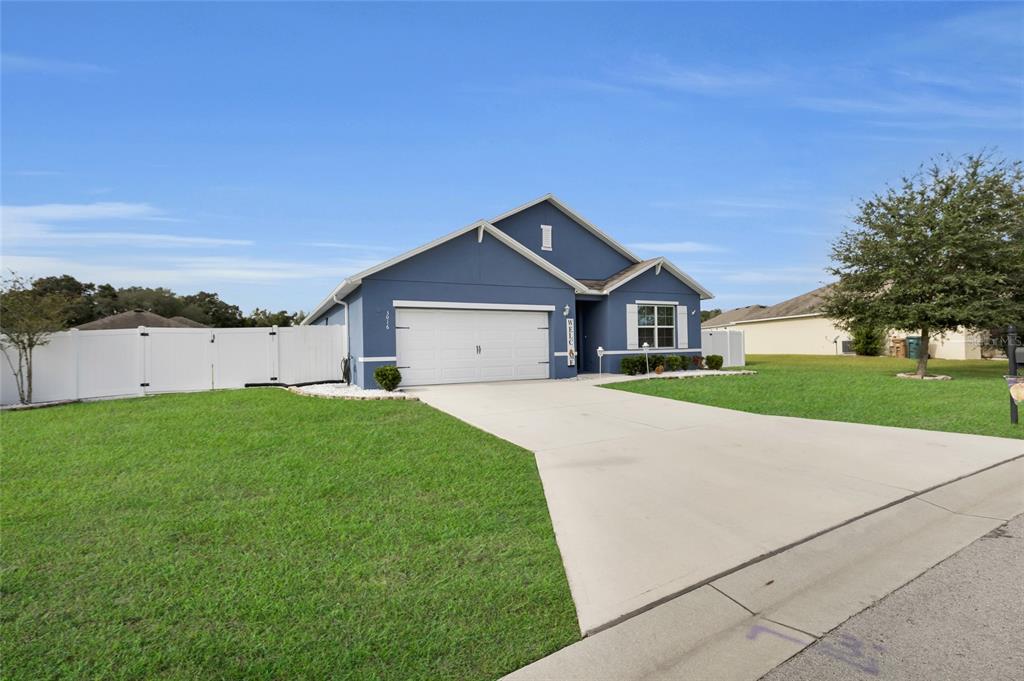 3016 Northeast 43rd Road Ocala, FL 34470 - Photo 34 of 35 a house view with a garden space