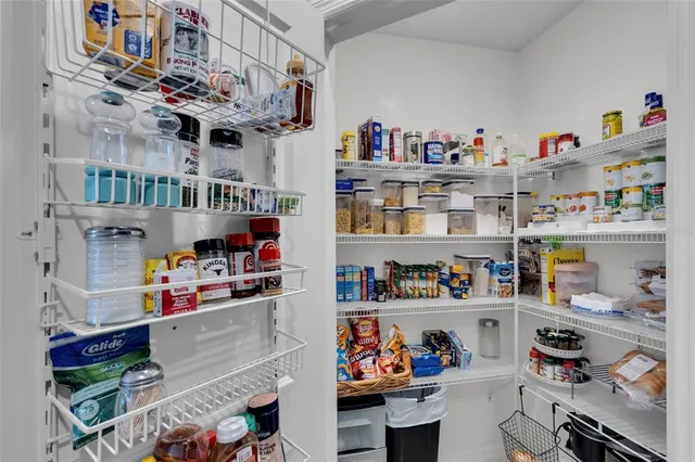 a kitchen with a stove and a microwave