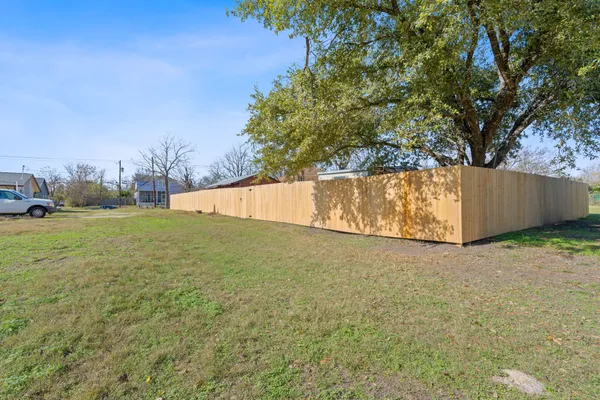 a view of backyard with green space
