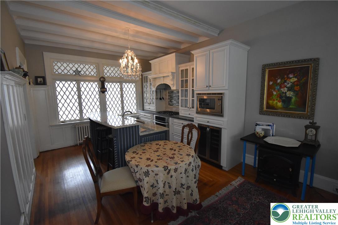 134 North 3rd Street Easton, PA 18042 - Photo 11 of 38 a view of a dining room with furniture window and wooden floor
