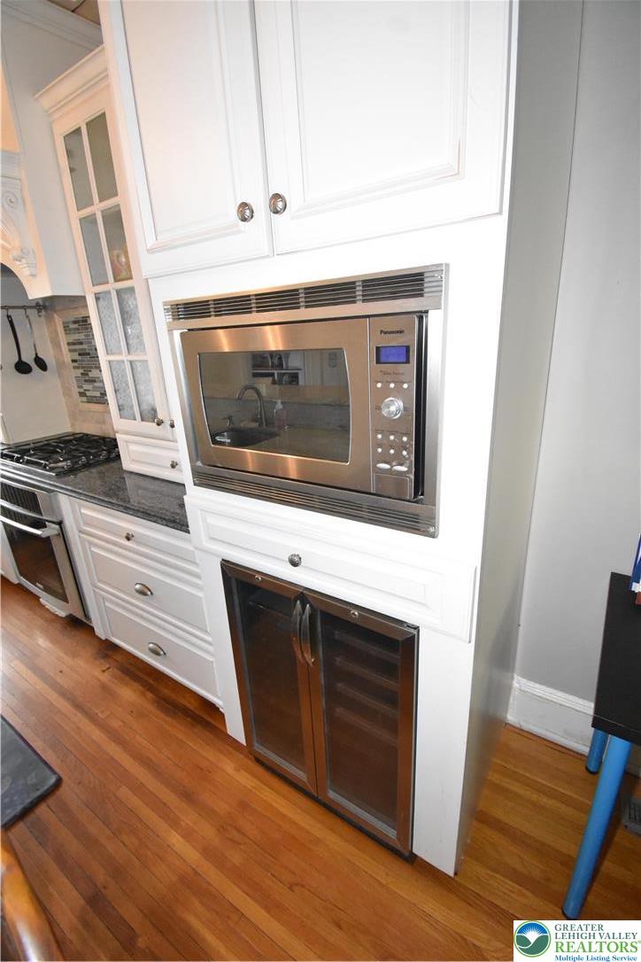 134 North 3rd Street Easton, PA 18042 - Photo 12 of 38 a view of washer and dryer with wooden floor