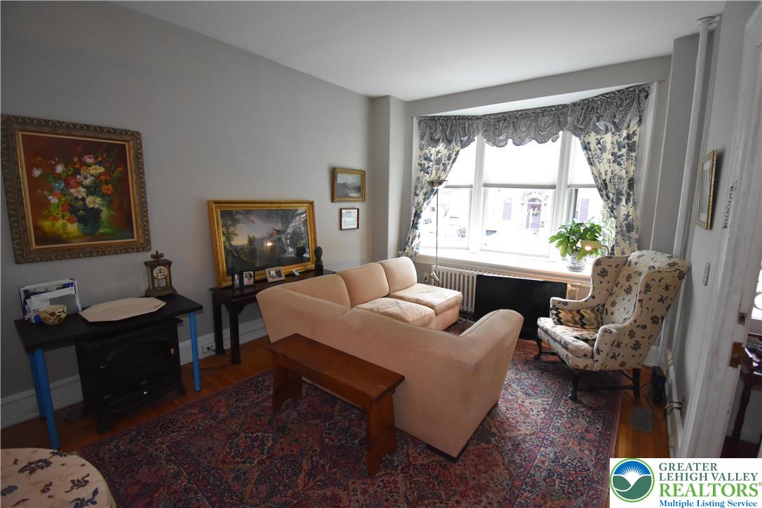 134 North 3rd Street Easton, PA 18042 - Photo 15 of 38 a bedroom with a bed and a window