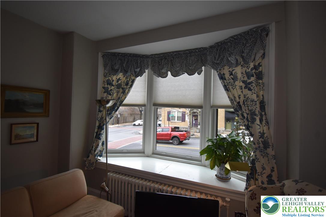 134 North 3rd Street Easton, PA 18042 - Photo 16 of 38 a living room with furniture and a potted plant