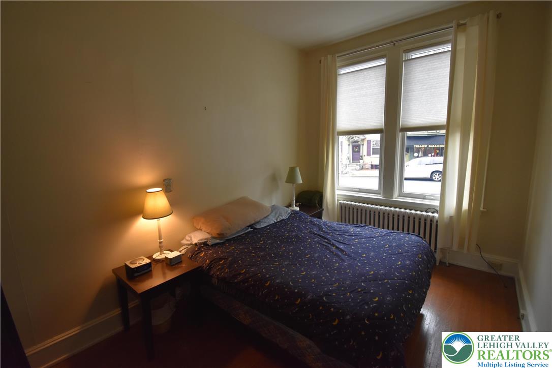 134 North 3rd Street Easton, PA 18042 - Photo 17 of 38 a bedroom with a bed and a window