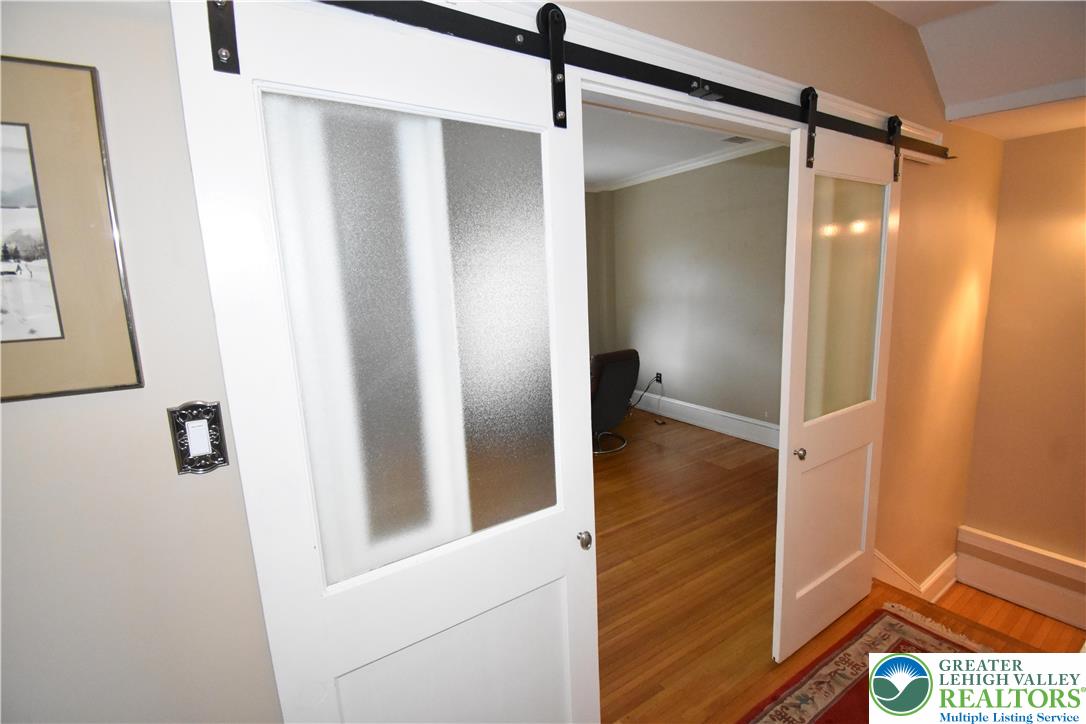 134 North 3rd Street Easton, PA 18042 - Photo 20 of 38 a bathroom with a shower and a mirror