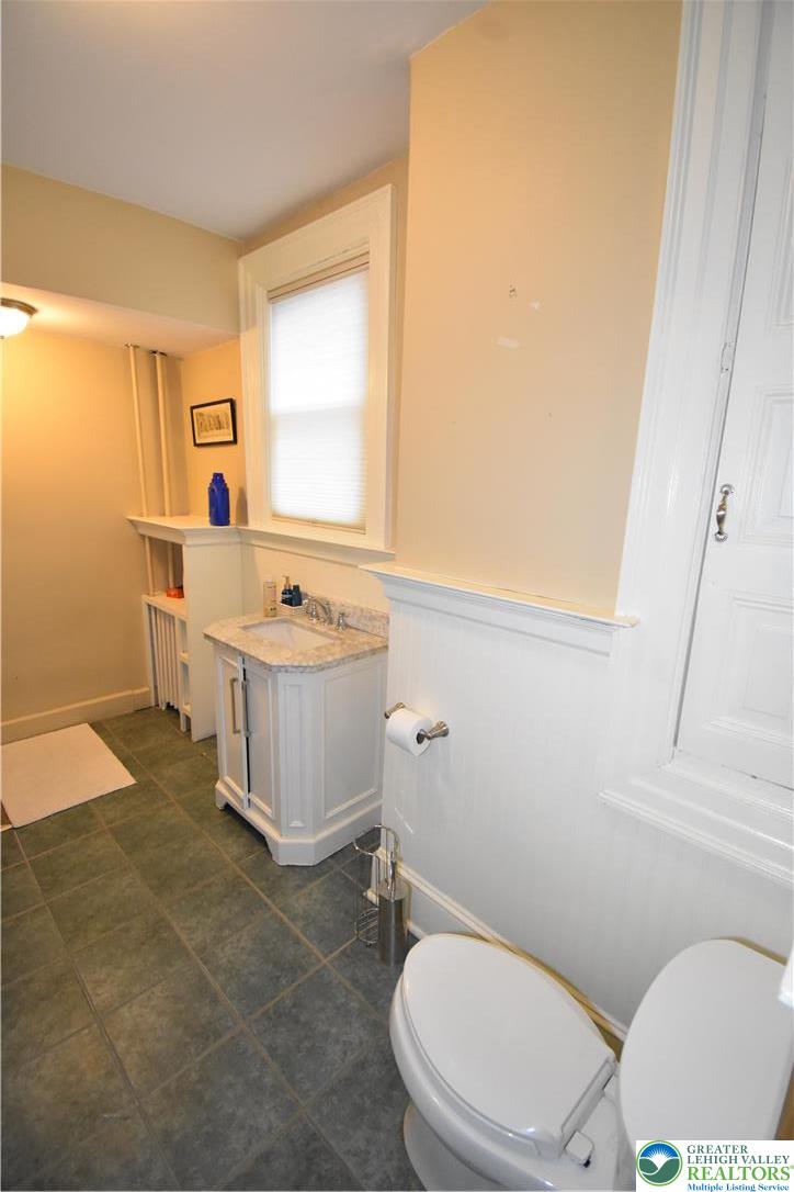 134 North 3rd Street Easton, PA 18042 - Photo 29 of 38 a bathroom with a sink a toilet and tub