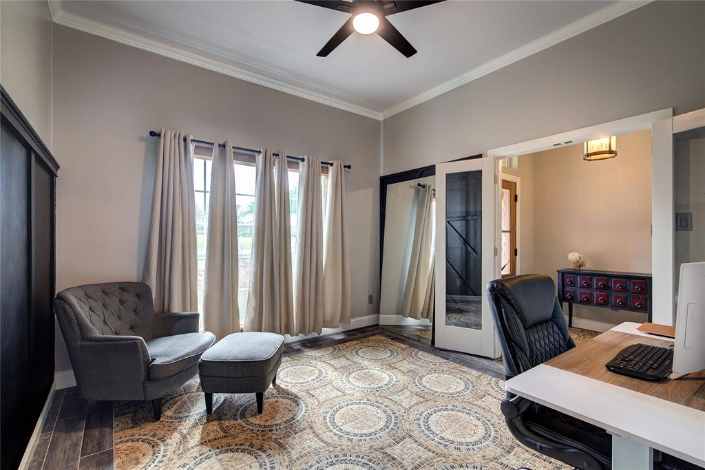 2027 Park Springs Road Sulphur Springs, TX 75482 - Photo 6 of 39 a bedroom with furniture and a window