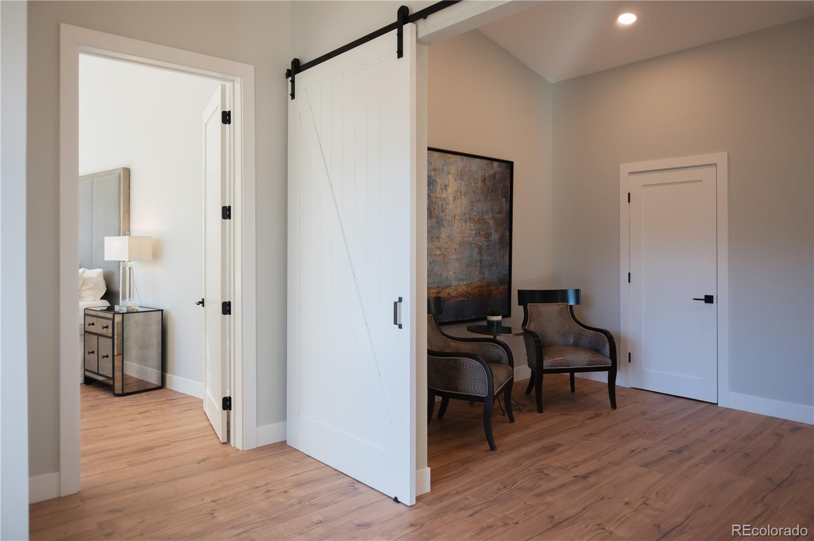 7231 Timber Trail Road Evergreen, CO 80439 - Photo 12 of 34 a view of a livingroom with furniture and front door