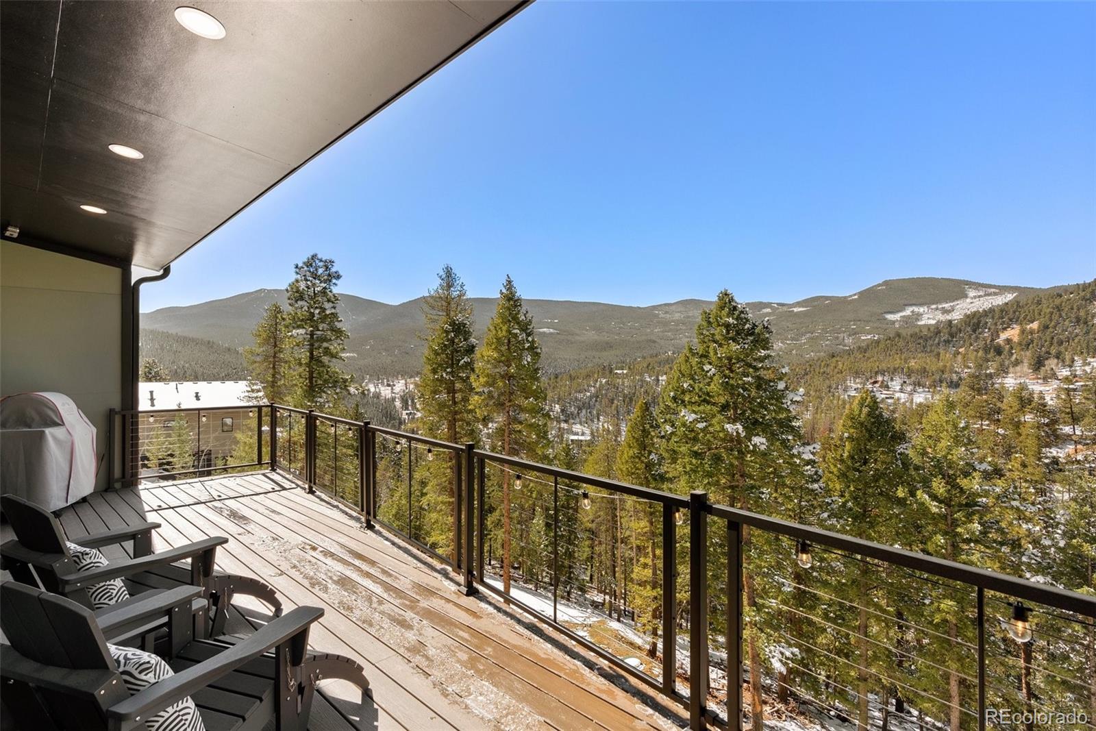 7231 Timber Trail Road Evergreen, CO 80439 - Photo 3 of 34 a view of balcony with furniture