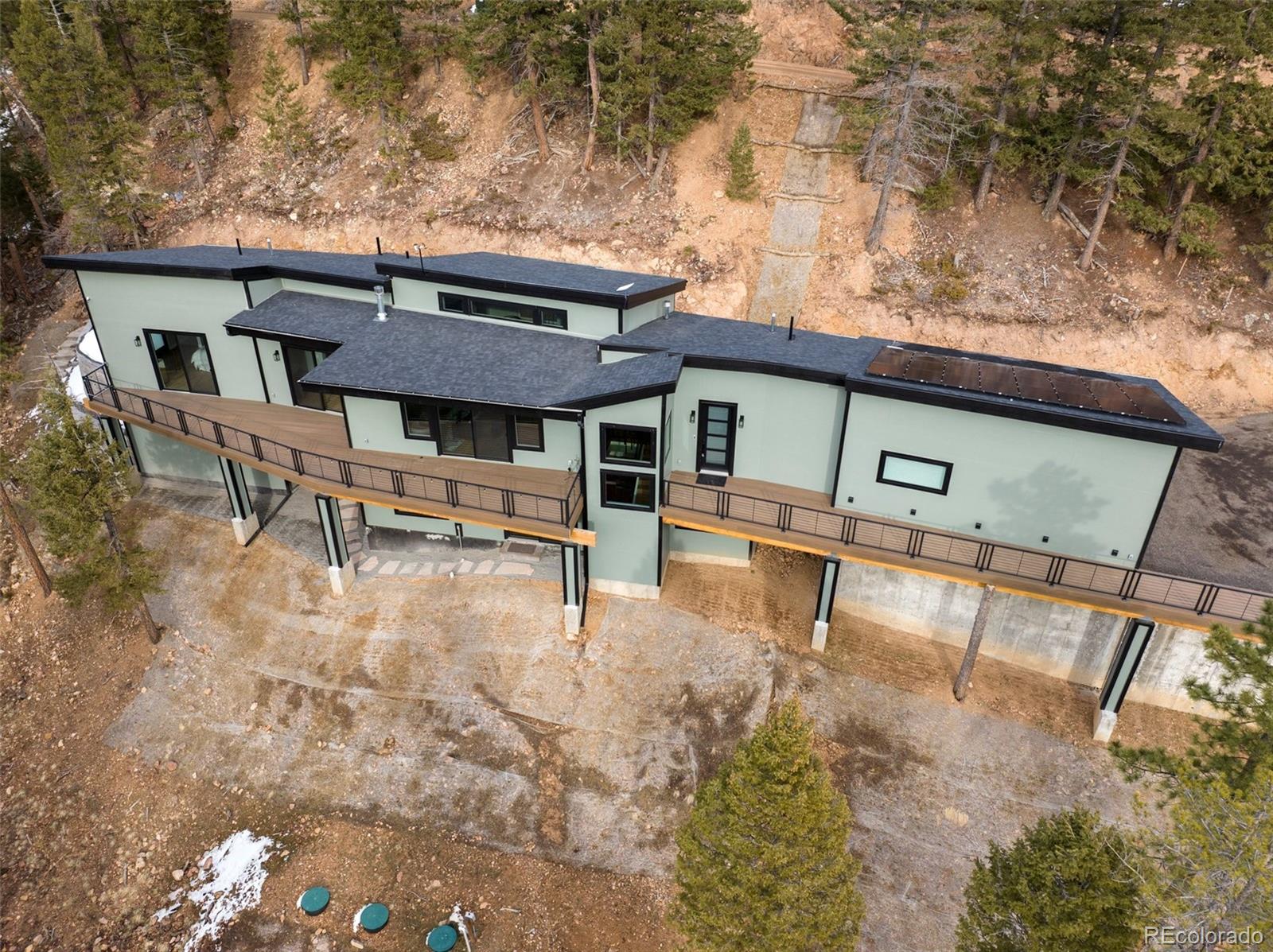 7231 Timber Trail Road Evergreen, CO 80439 - Photo 33 of 34 a house view with a outdoor space