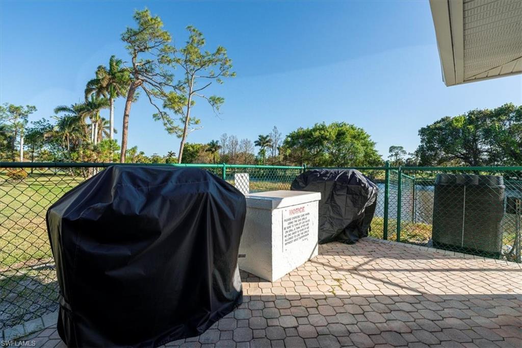 5515 Rattlesnake Hamm Road, Unit 301 Naples, FL 34113 - Photo 26 of 31 Community BBQ area off the Pool Area