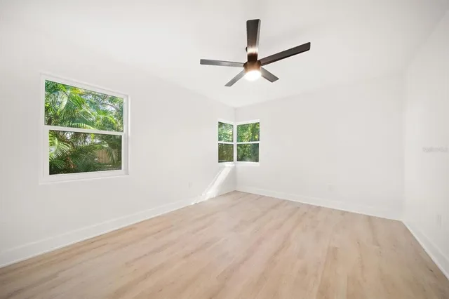 a view of a house with backyard from a porch