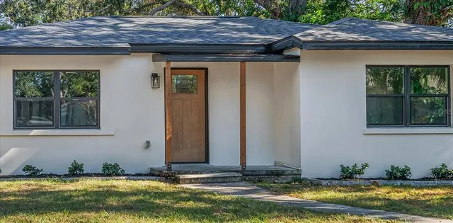 a view of swimming pool with a yard