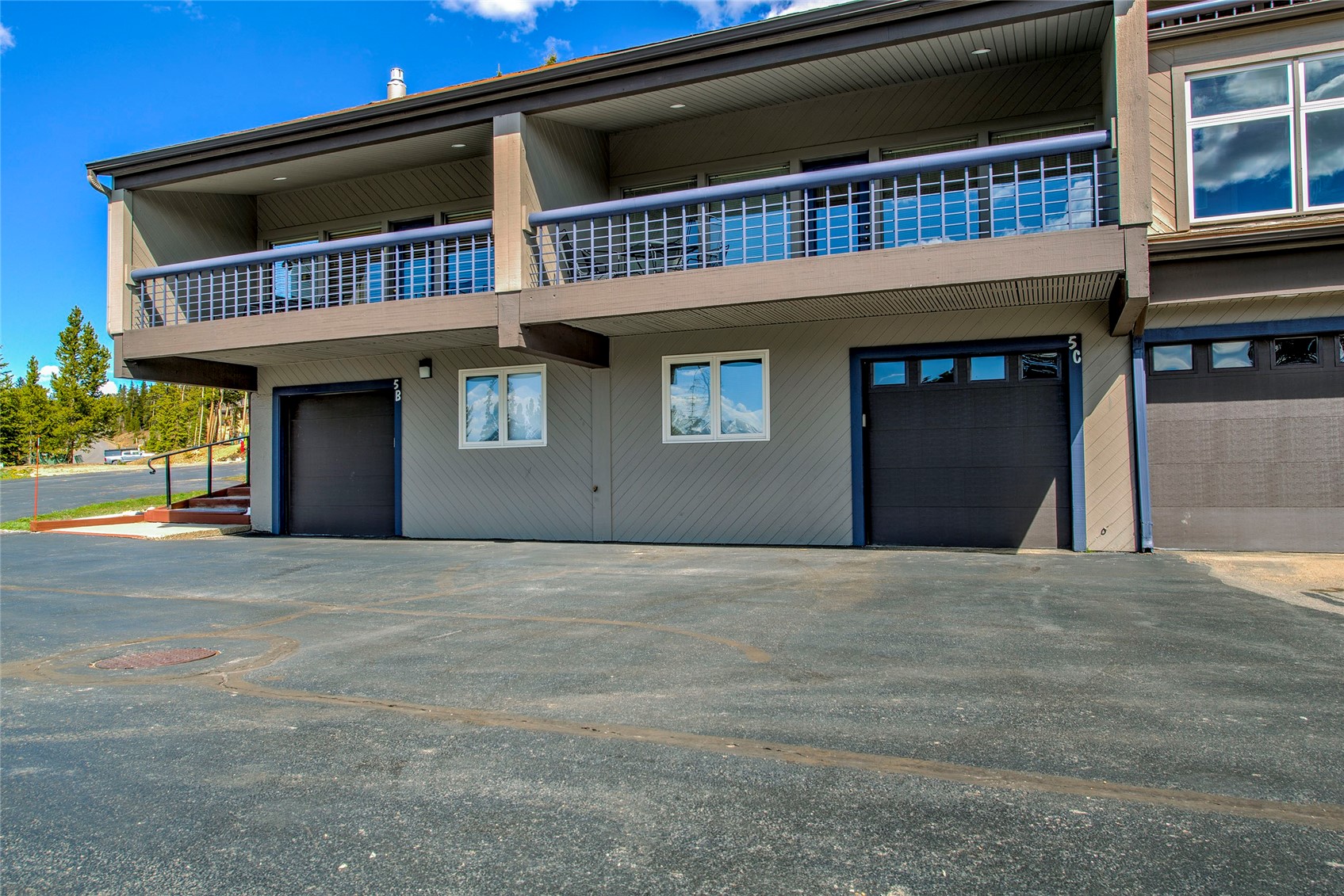 187 Fuller Placer Road, Unit B Breckenridge, CO 80424 - Photo 27 of 33 a view of a house with a balcony