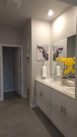 a view of an empty room with a bathroom