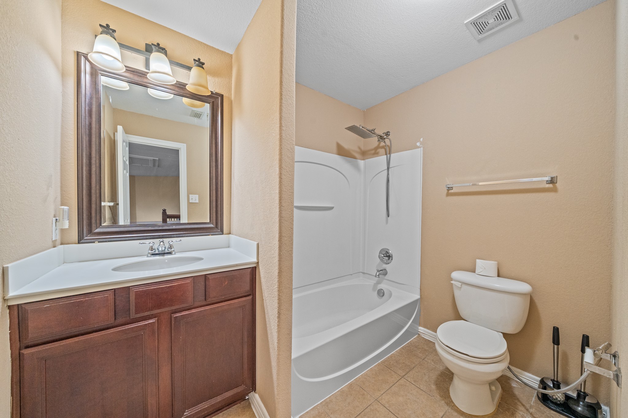 8711 Preston Field Lane Houston, TX 77095 - Photo 32 of 41 a bathroom with a sink toilet tub and shower