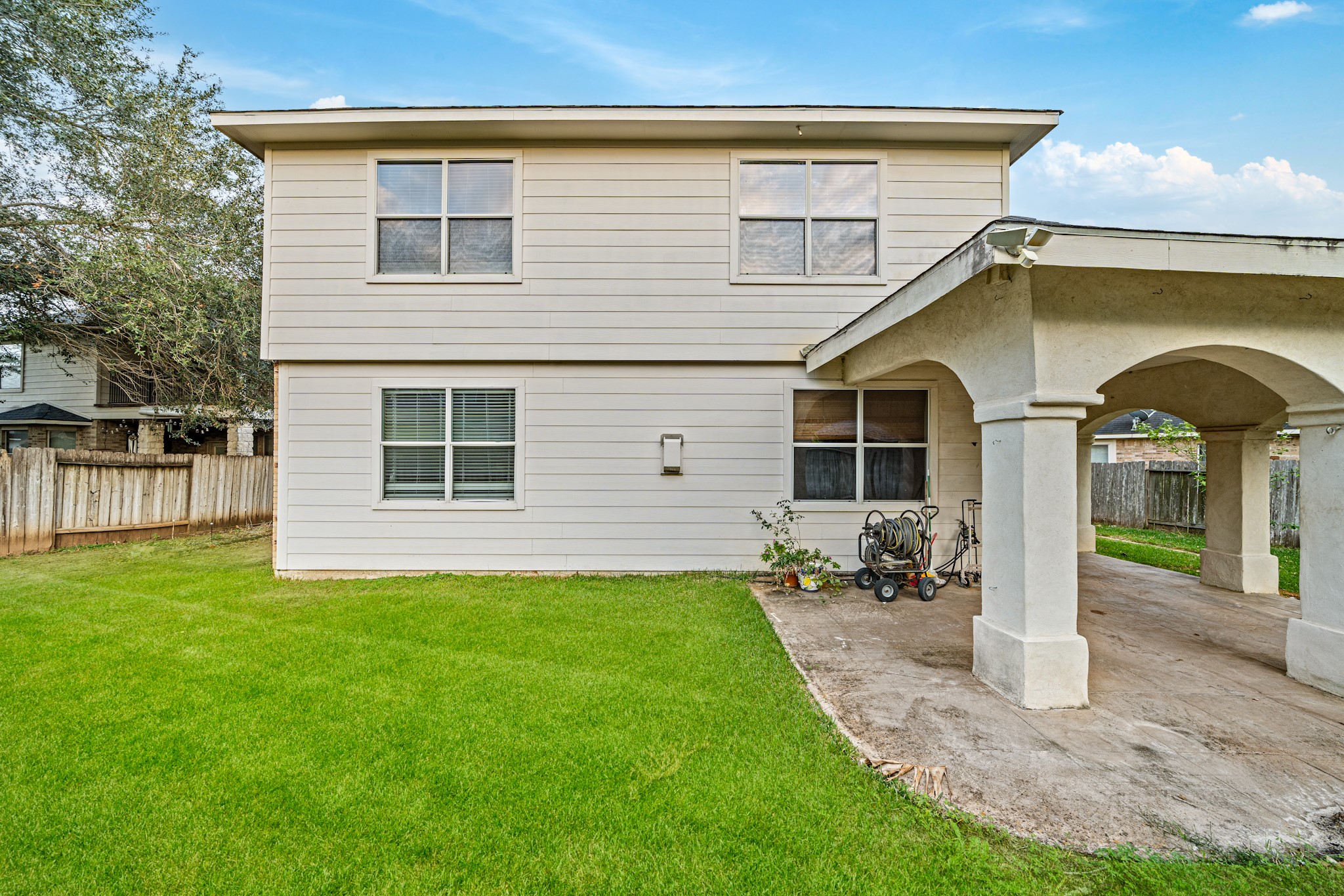 8711 Preston Field Lane Houston, TX 77095 - Photo 40 of 41 a front view of a house with a yard
